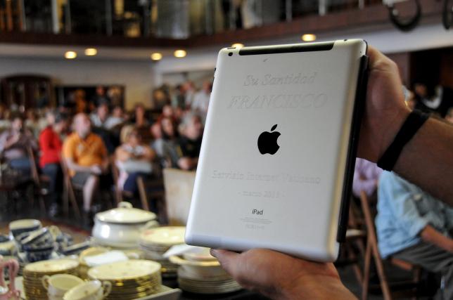 An Apple iPad which belonged to Pope Francis is seen at Castells auction house in Montevideo